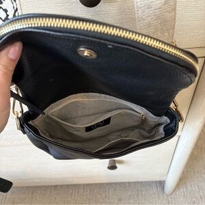 Chic Black Crossbody Bag with Gold Accents